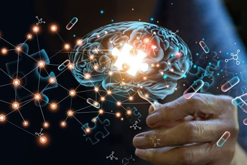 Brain held in a hand with glowing neural connections and medication icons, representing psychopharmacology